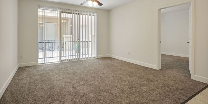 Vistoso Affordable Apartments Boulder - Two Bedroom Apartment - Living Area Patio View
